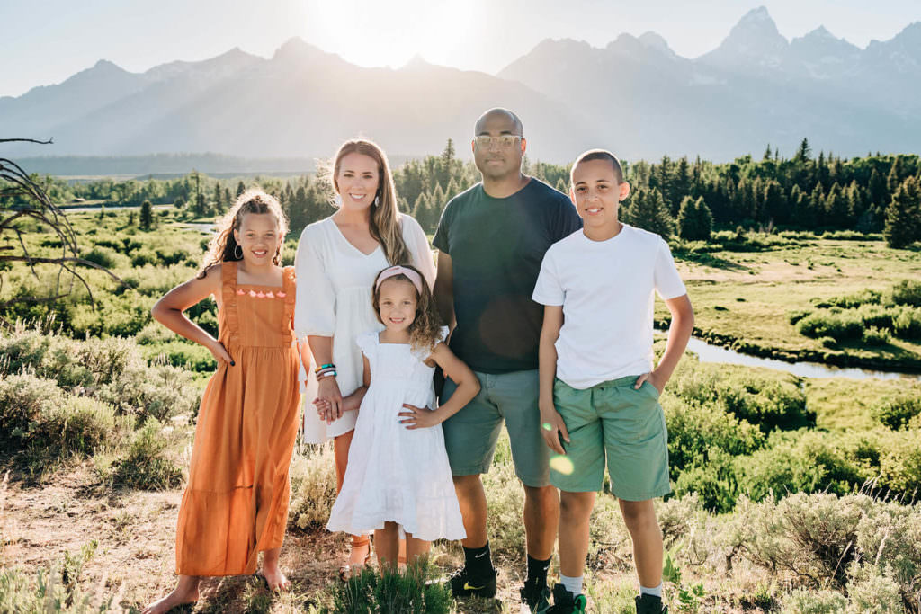 family by mountain in in Grand Tetons