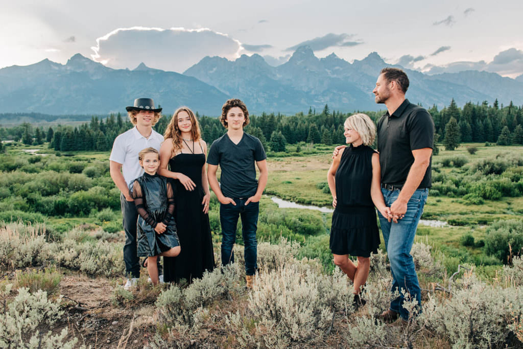 family portrait by mountain