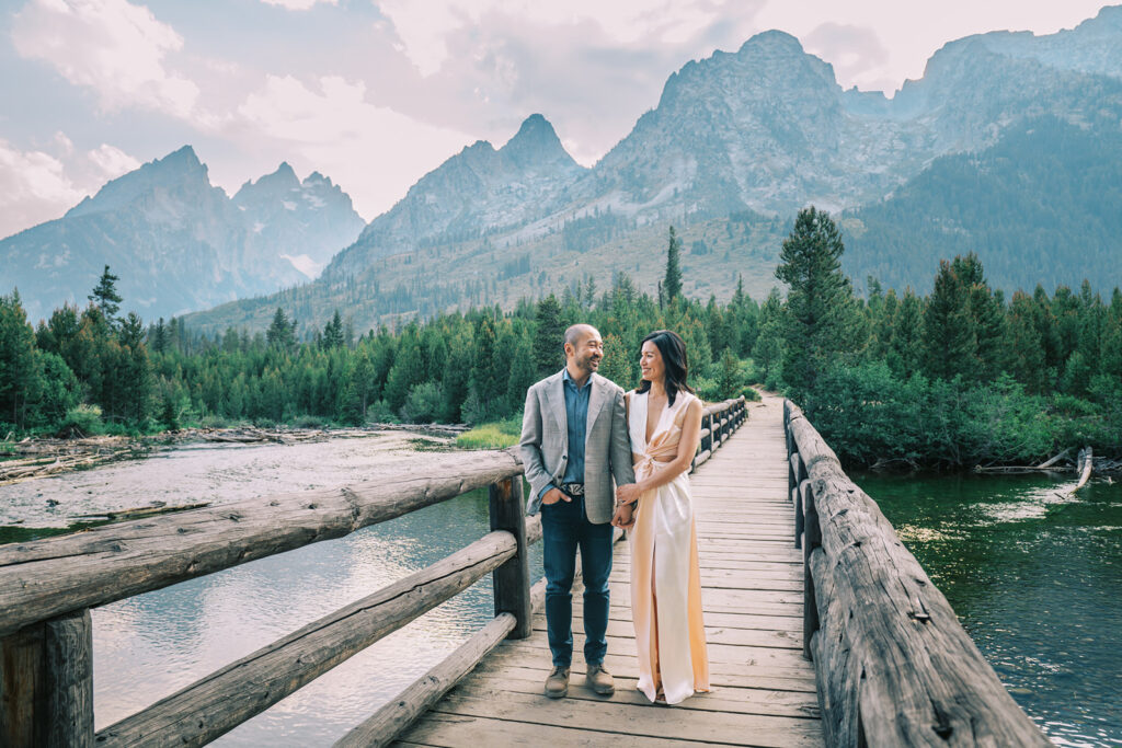 couple holding hands in Jackson Hole, family photos in Grand Teton National Park