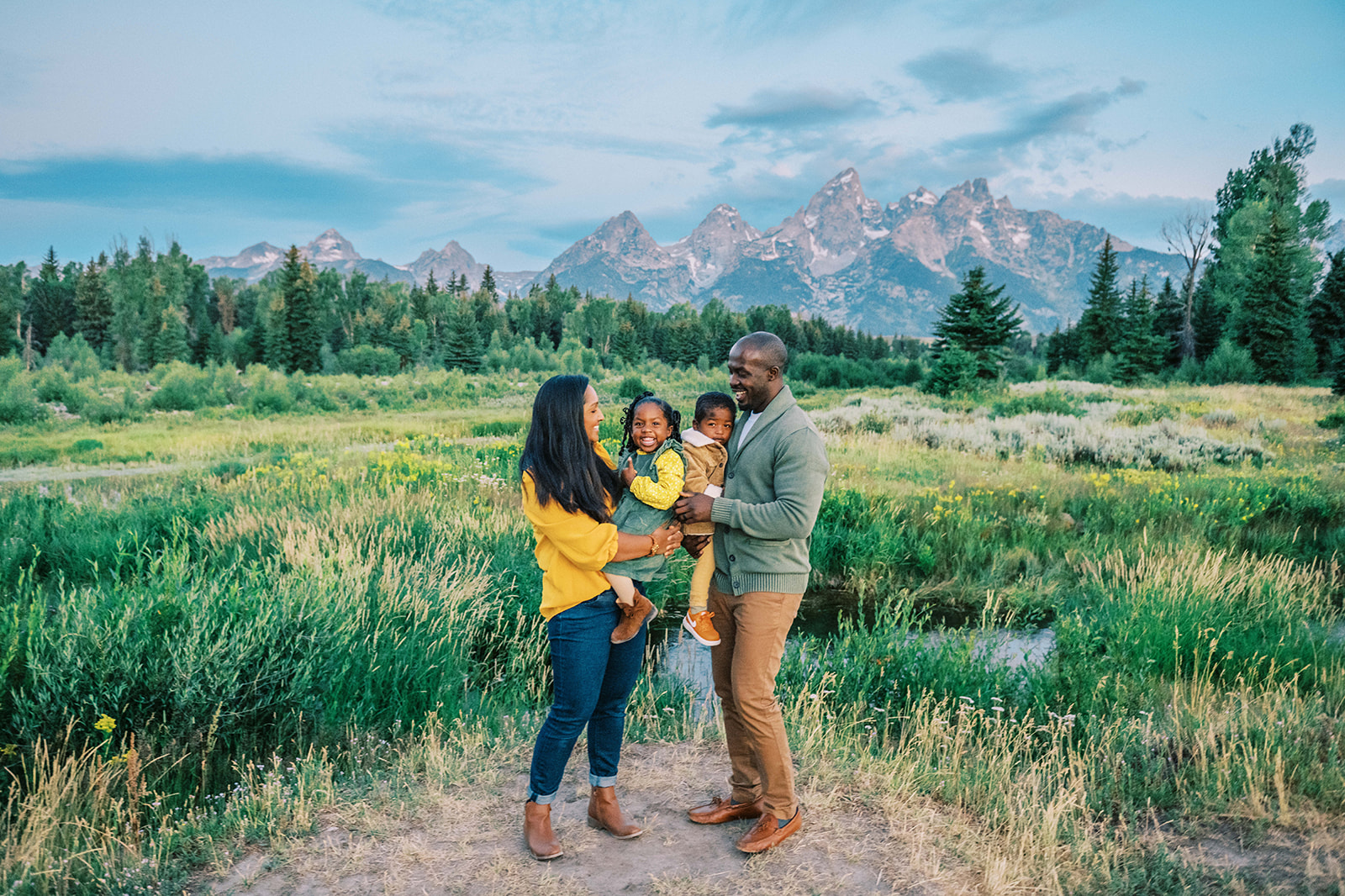 family posing in Grand Teton National Park, family portraits in Jackson Hole