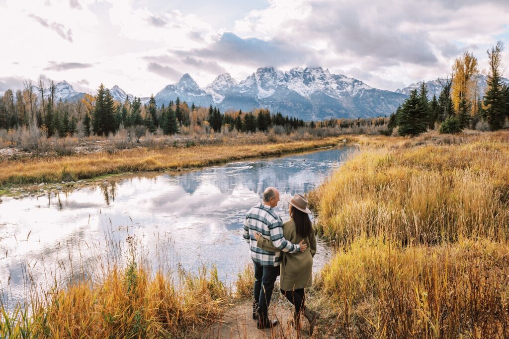 Scene highlighting Fall foliage near a river in Wyoming