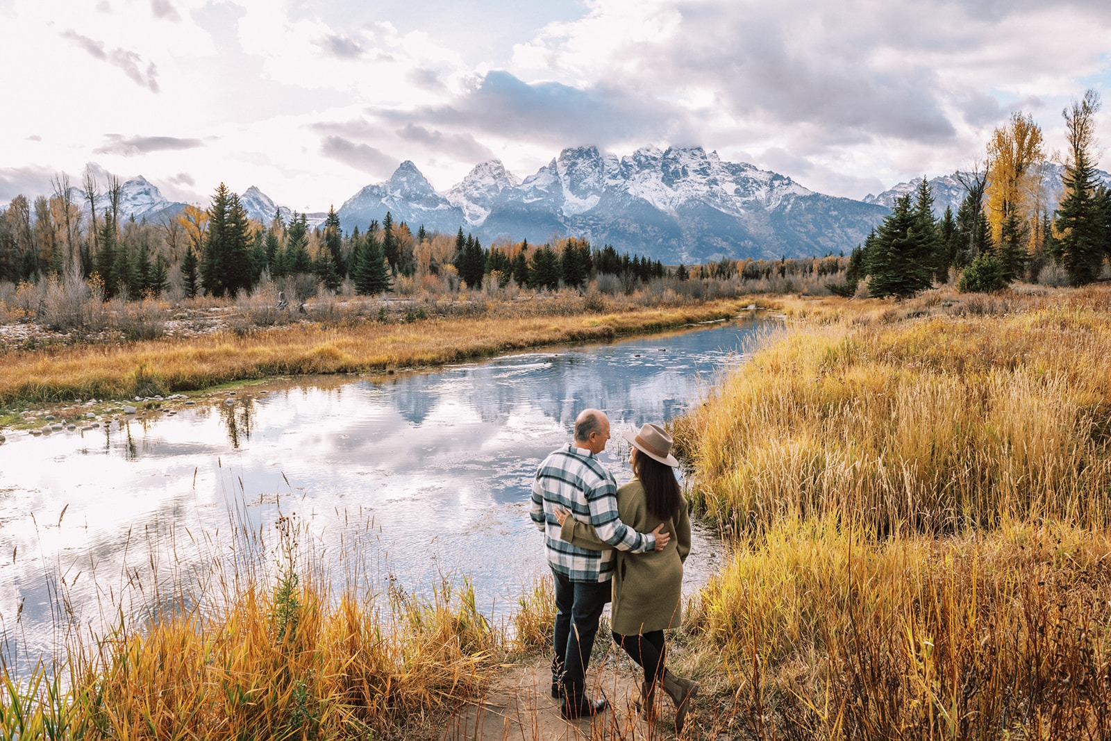 couple overlooking the Snake River in Grand Teton National Park
