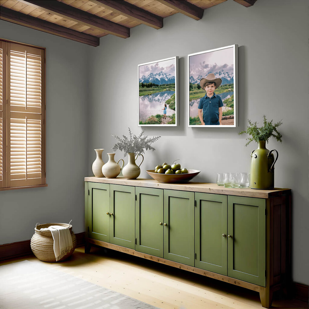 Two fine art prints hang framed over an entry table after learning how to display your family portraits